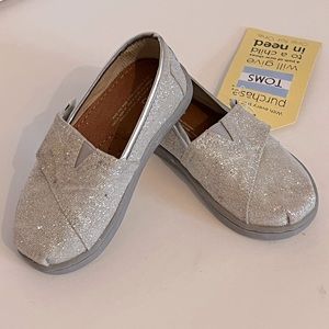 New Toms silver shoes